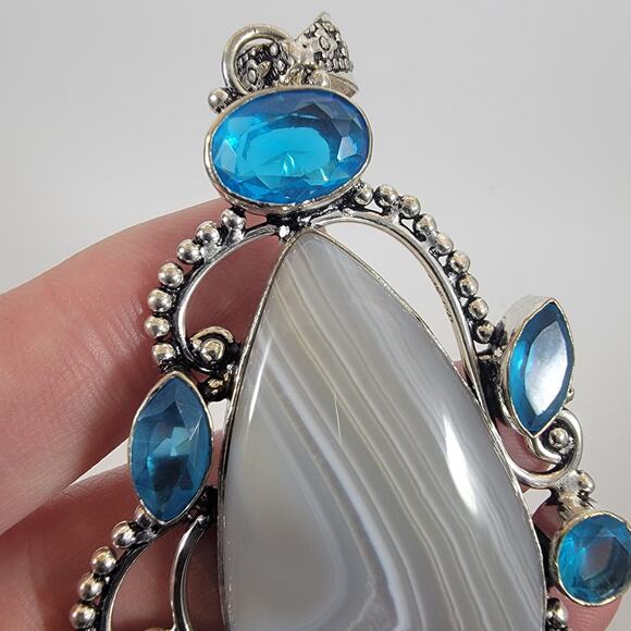 Handmade Silver Pendant Featuring Banded Agate & Five Faceted Blue Topaz Stones - Picture 8 of 10